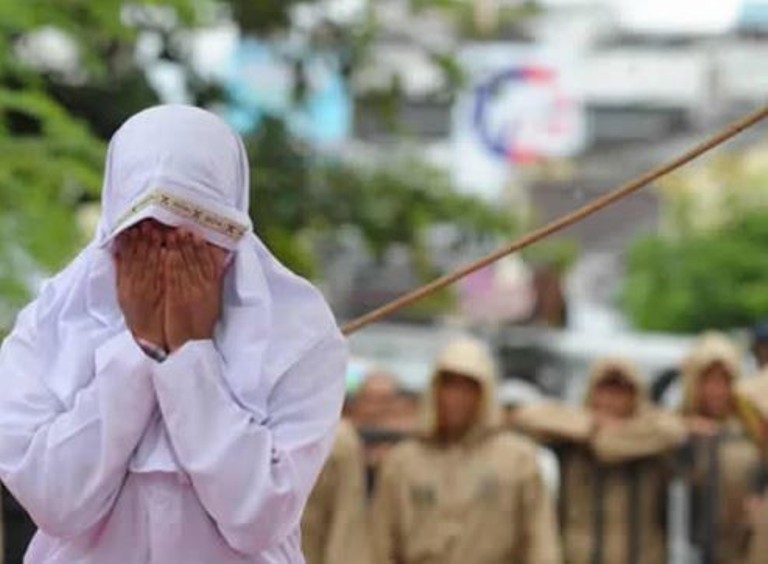 Couples caned for having sex outside marriage [Photos] 51