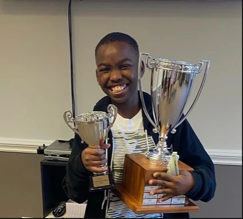 Nigerian refugee, 10, becomes US national chess master. 1