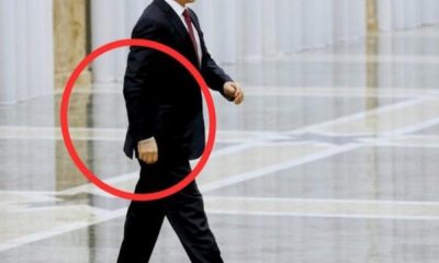 Why Putin walk with right hand completely still. 45