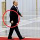 Why Putin walk with right hand completely still. 46