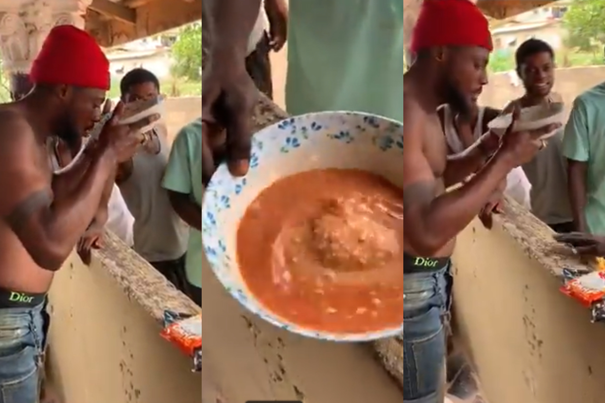 Man completing Alomo Bitters and gari mix challenge in Ghana for GHS10 reward