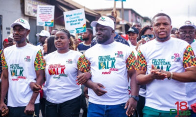 Participants of the Momentum Walk in traditional wear and NDC-branded outfits marching through Kumasi, advocating for youth empowerment and anti-drug abuse.