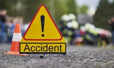 Scene of a crash between a VIP bus and a Toyota Venza on the Accra-Kumasi highway, with emergency responders attending to victims.