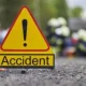 Scene of a crash between a VIP bus and a Toyota Venza on the Accra-Kumasi highway, with emergency responders attending to victims.