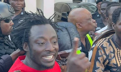 Activist Ralph De Fellow confronting water sellers on a busy Accra street over plastic littering