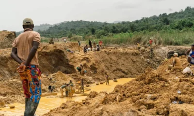 Excavators operating near a river in Ghana, symbolizing the threat of illegal mining