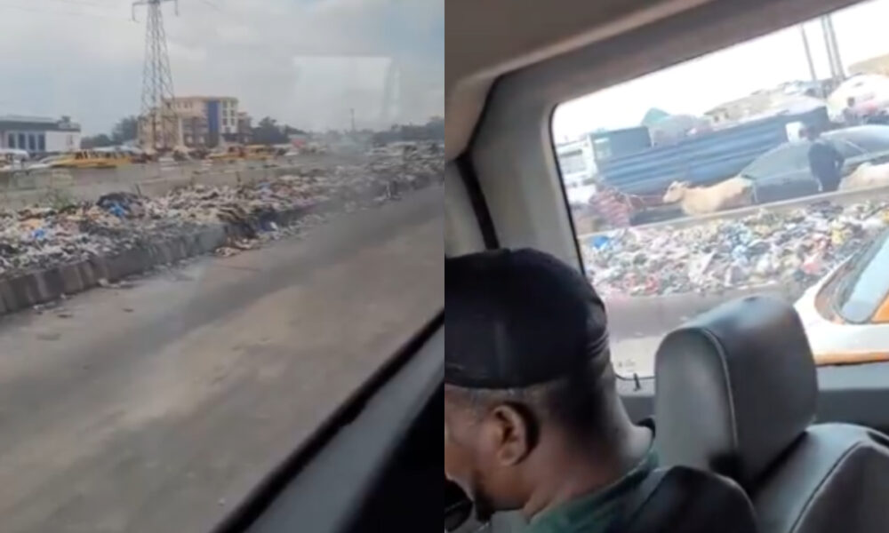Garbage piled on both sides of the road in Lagos captured by Ghanaian visitor