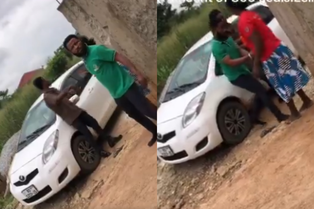 Loan collector forcibly dragging a distressed woman into a vehicle during a public altercation over unpaid debt.