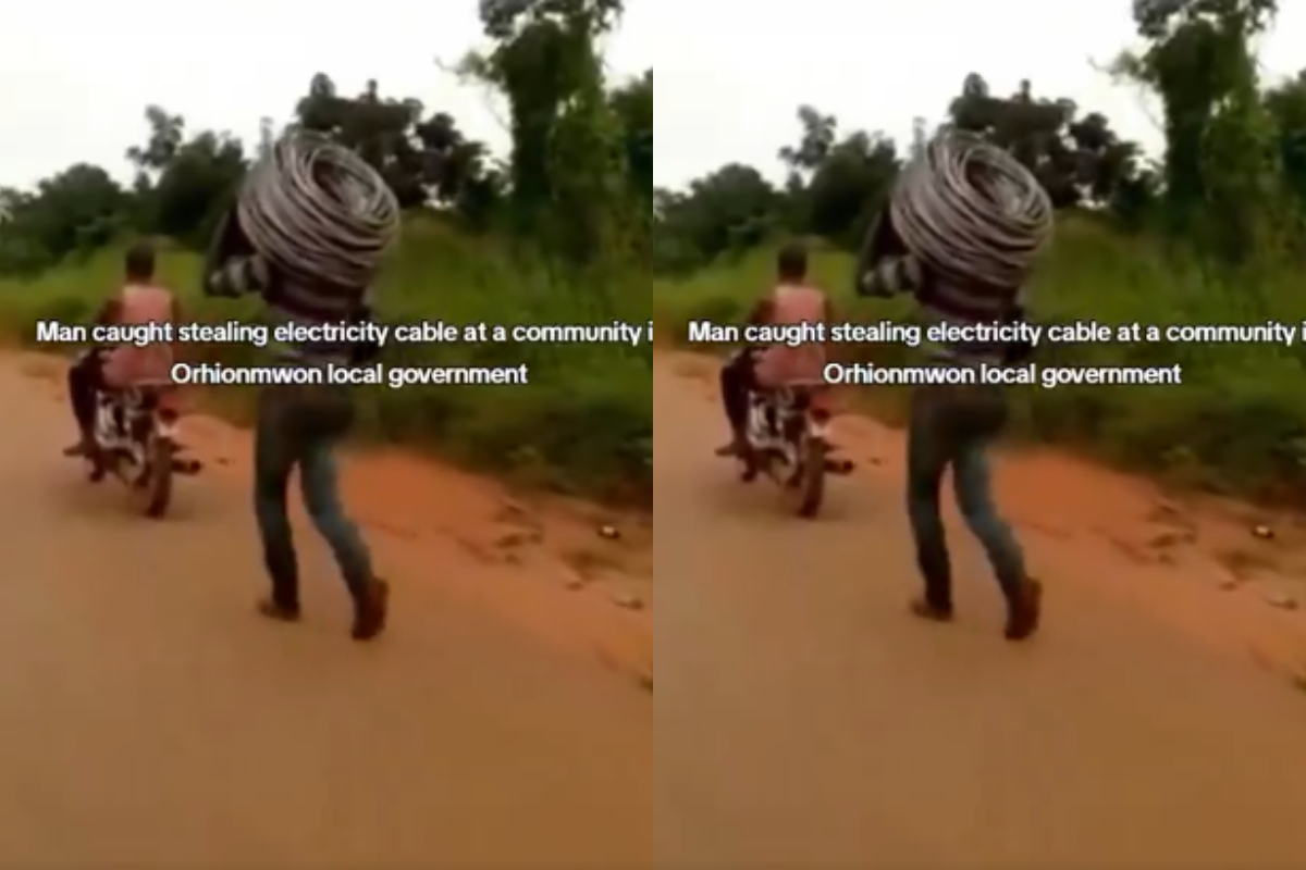 Suspected thief tied to motorbike carrying stolen cables in Ghana
