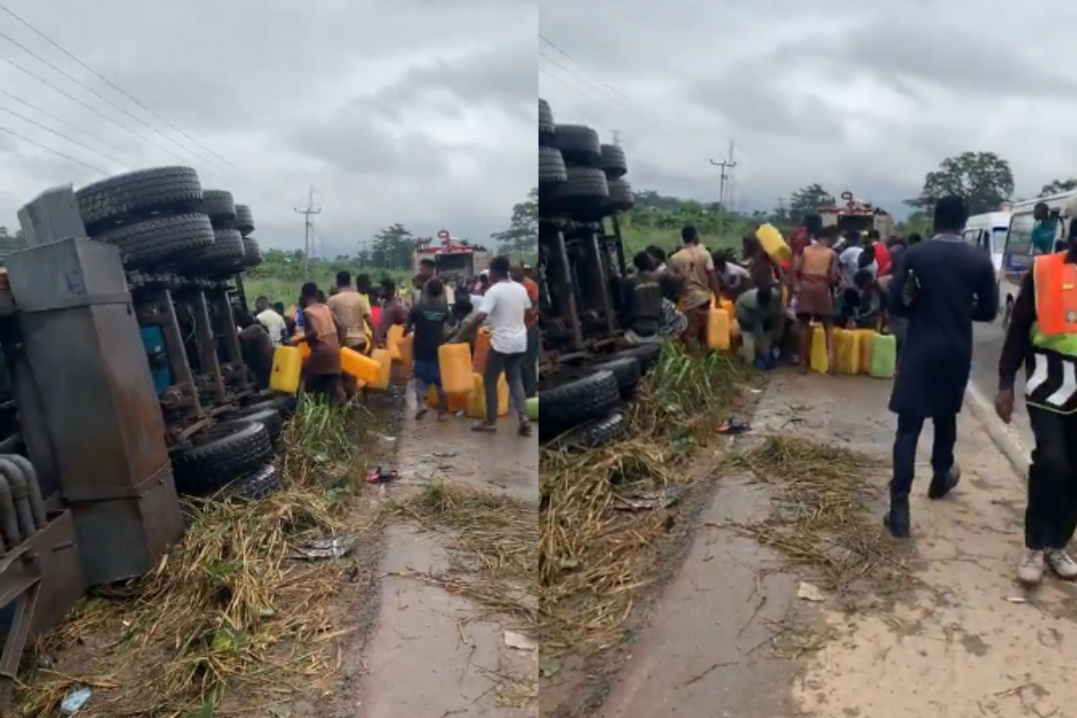Crowd in Anyinam scooping fuel from overturned tanker despite police presence.