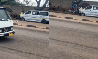 Trotro driver in Kumasi speeds off with MTTD officer clinging to the bonnet during an attempted arrest, caught on viral video.
