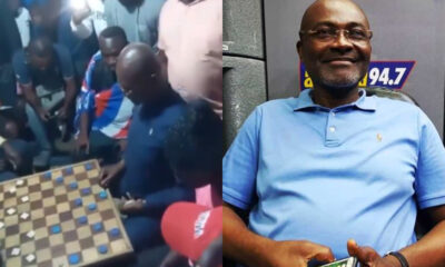 Kennedy Agyapong playing draughts with a local opponent in Ablekuma North as supporters cheer during a campaign visit for Nana Akua Owusu Afriyie.