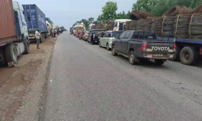 Stranded vehicles and passengers on Kintampo highway after accident blockage