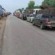 Stranded vehicles and passengers on Kintampo highway after accident blockage