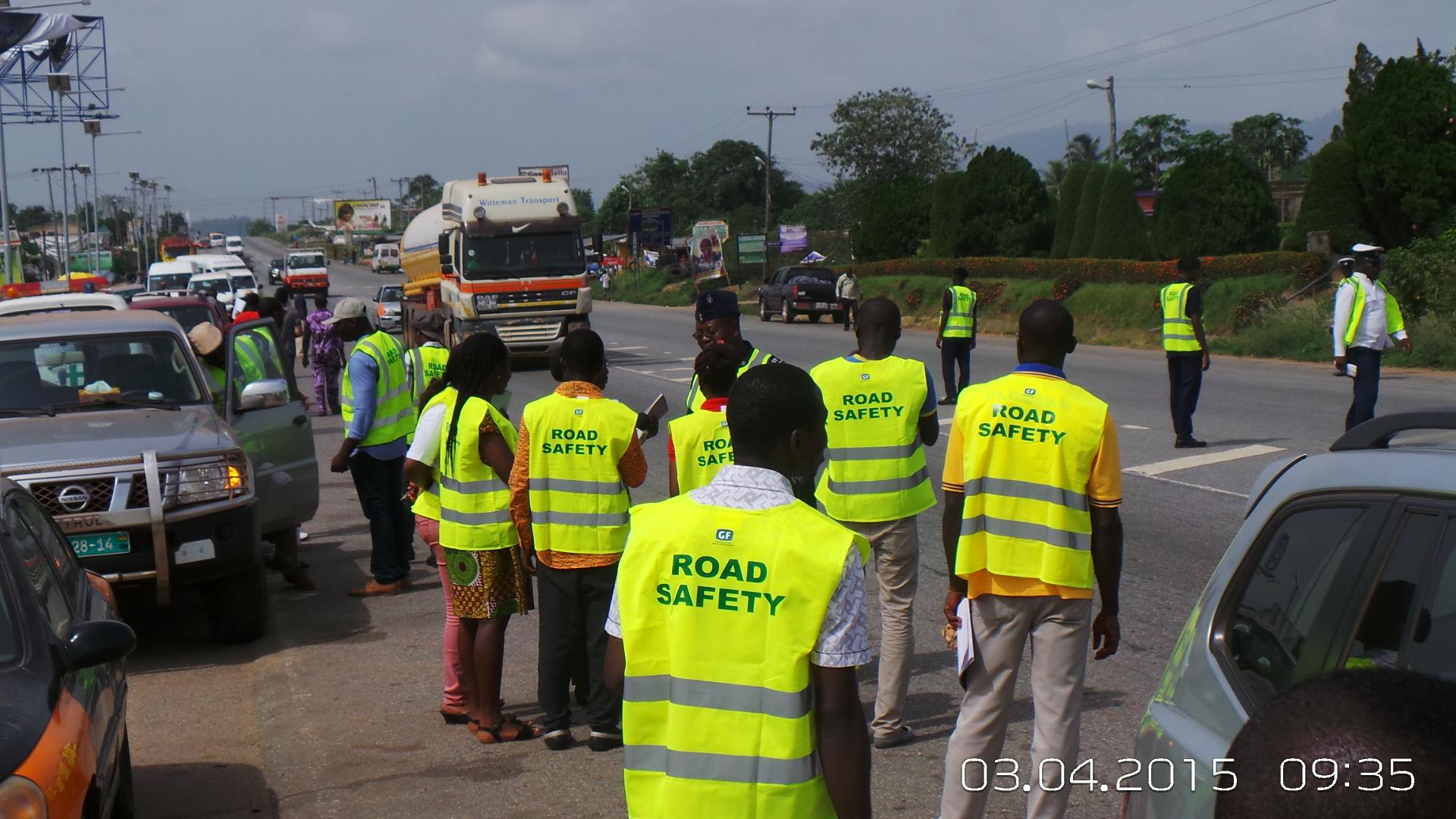 NRSA officers removing unauthorized billboards from road medians in Accra