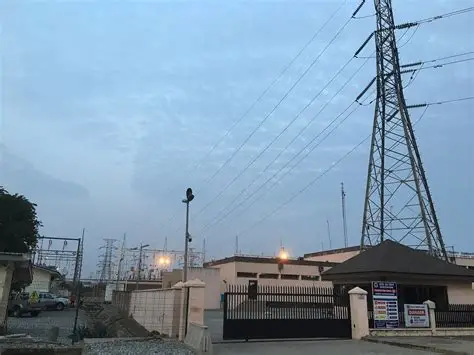 Residents of Asikantia gather in celebration as electricity poles stand tall following their first connection to the national grid in Ahafo Ano South West.