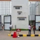 Bank of Ghana building with signage highlighting remittance regulations