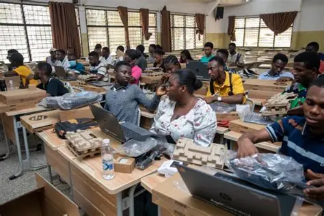 Students celebrating SLTF loan disbursement at a tertiary campus in Ghana