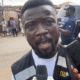 Aggressive police officer slaps GHOne TV journalist Banahene Agyekum at Odorkor polling station during Ablekuma North rerun
