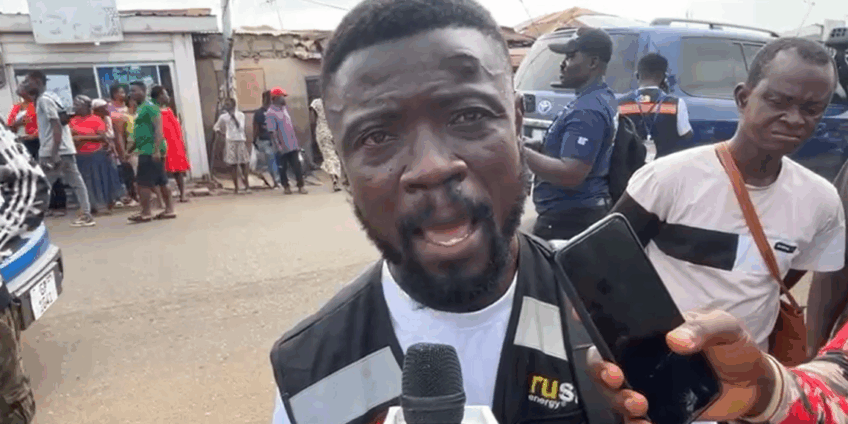 Aggressive police officer slaps GHOne TV journalist Banahene Agyekum at Odorkor polling station during Ablekuma North rerun