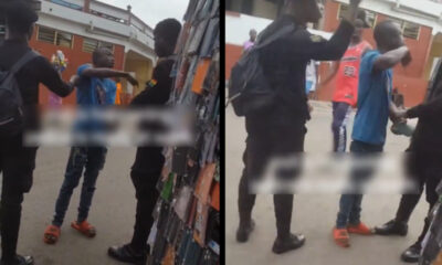 Two police officers seen in a viral video slapping a young man accused of attempted fraud.