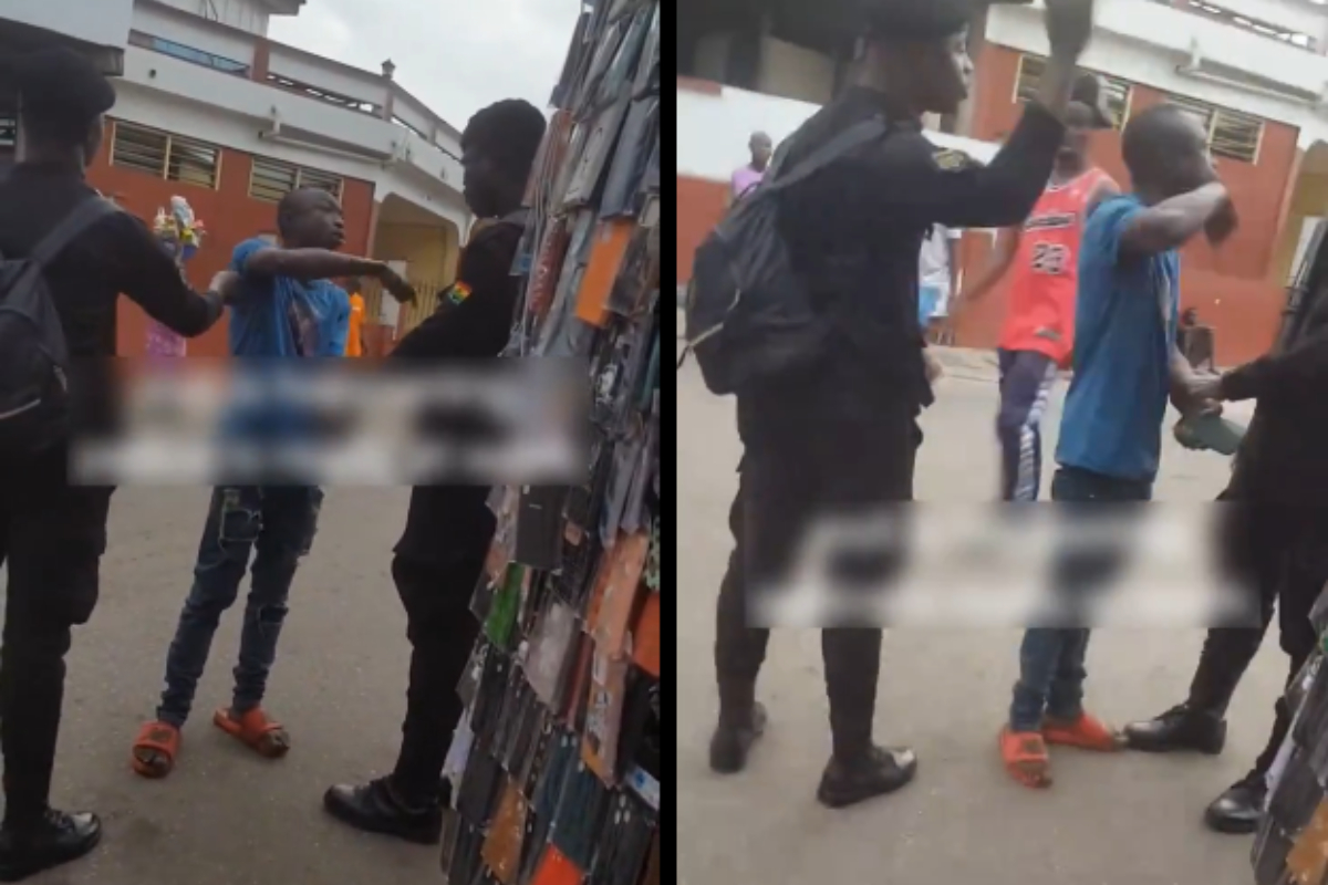 Two police officers seen in a viral video slapping a young man accused of attempted fraud.