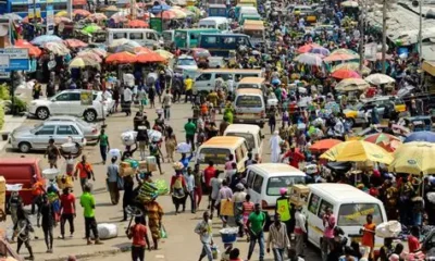 Trader at Ghanaian market expressing concern over unchanged prices despite fuel and cedi improvements