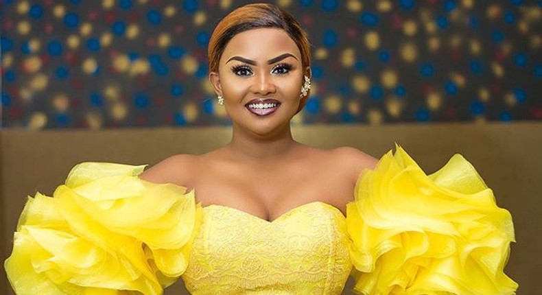 Ghanaian actress Nana Ama McBrown smiles during a public appearance after undergoing her fifth hand surgery.