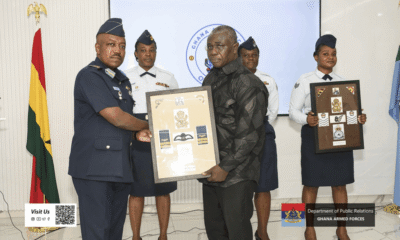 Chief of Defence Staff Lt. Gen. William Agyapong presenting posthumous insignia to families of soldiers who perished in the Adansi helicopter crash at a solemn ceremony in Accra.