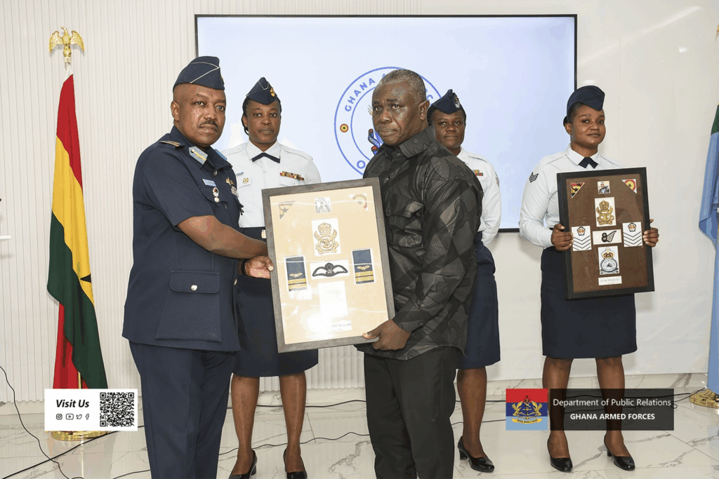 Chief of Defence Staff Lt. Gen. William Agyapong presenting posthumous insignia to families of soldiers who perished in the Adansi helicopter crash at a solemn ceremony in Accra.