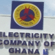 Electricity Company of Ghana staff attending to customers at an ECG office.