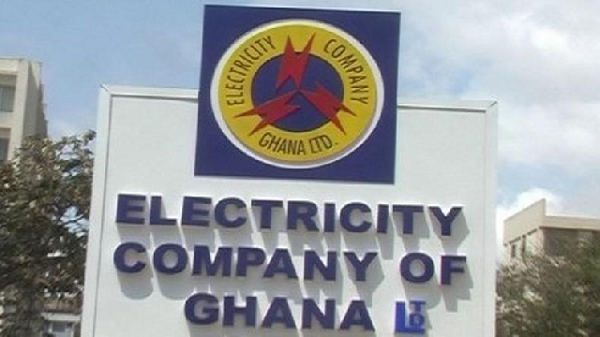 Electricity Company of Ghana staff attending to customers at an ECG office.