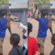 Kwahu Obomeng residents parade a man accused of stealing plantain through the township while he carries it in a pan.