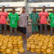 Tema Community 1 Police displaying seized parcels of suspected Indian hemp.