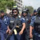 ✅ Alt text for images: “Police officers on patrol in Sampa after chieftaincy clashes.