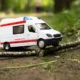 Ambulance stuck on the Abuakwa–Mankranso road as residents assist health workers to free the vehicle