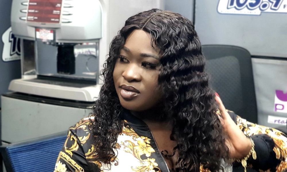 Sista Afia during a radio interview recounting how she hit a fan with a microphone for inappropriate behavior.