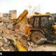 Suspected land guards demolish shops on disputed land at Spintex