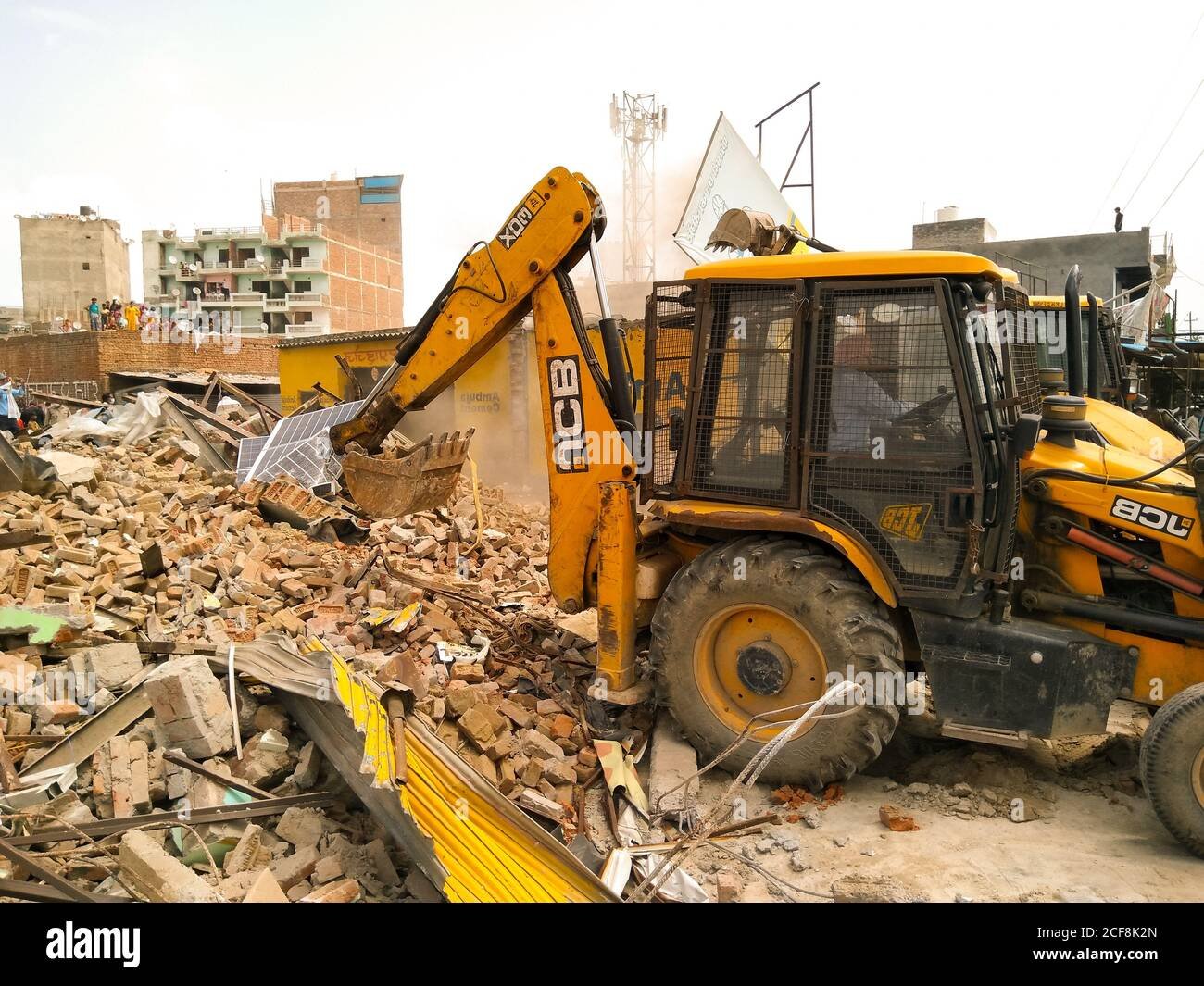 Suspected land guards demolish shops on disputed land at Spintex