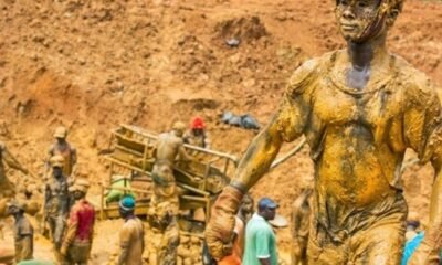 Illegal mining site in Ghana showing polluted water and damaged land