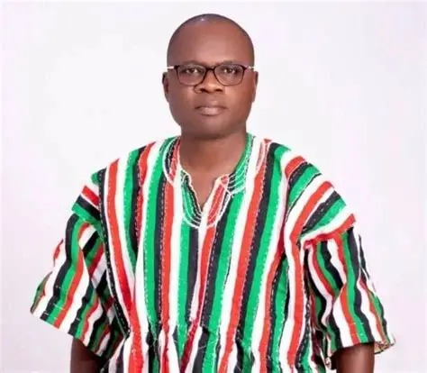 Central Regional Minister addressing staff during a performance review meeting.