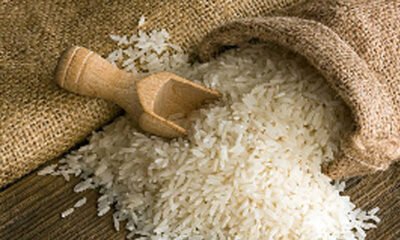Sacks of rice and sugar displayed at a Ghanaian market