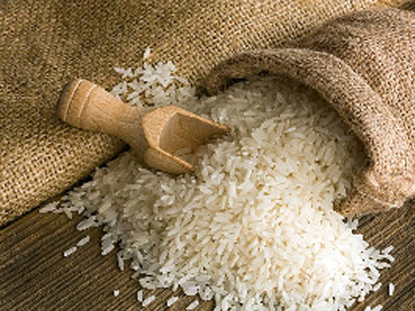 Sacks of rice and sugar displayed at a Ghanaian market