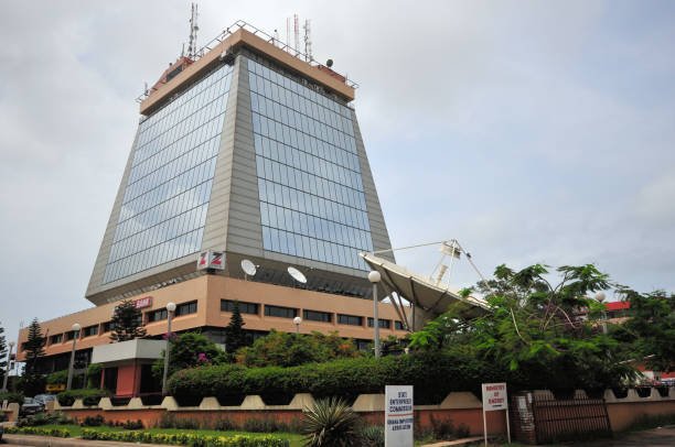 A stack of academic certificates being verified for authenticity