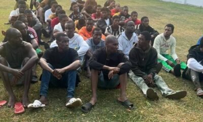 Security operatives during cybercrime raid in Dawhenya, Ningo-Prampram