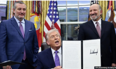 US President Donald Trump signs executive order blocking state AI regulations