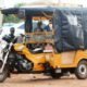 Commercial tricycle riders operating in an urban area in Ghana