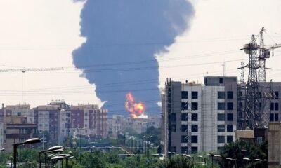 Smoke rising over an Iranian city following recent bombings